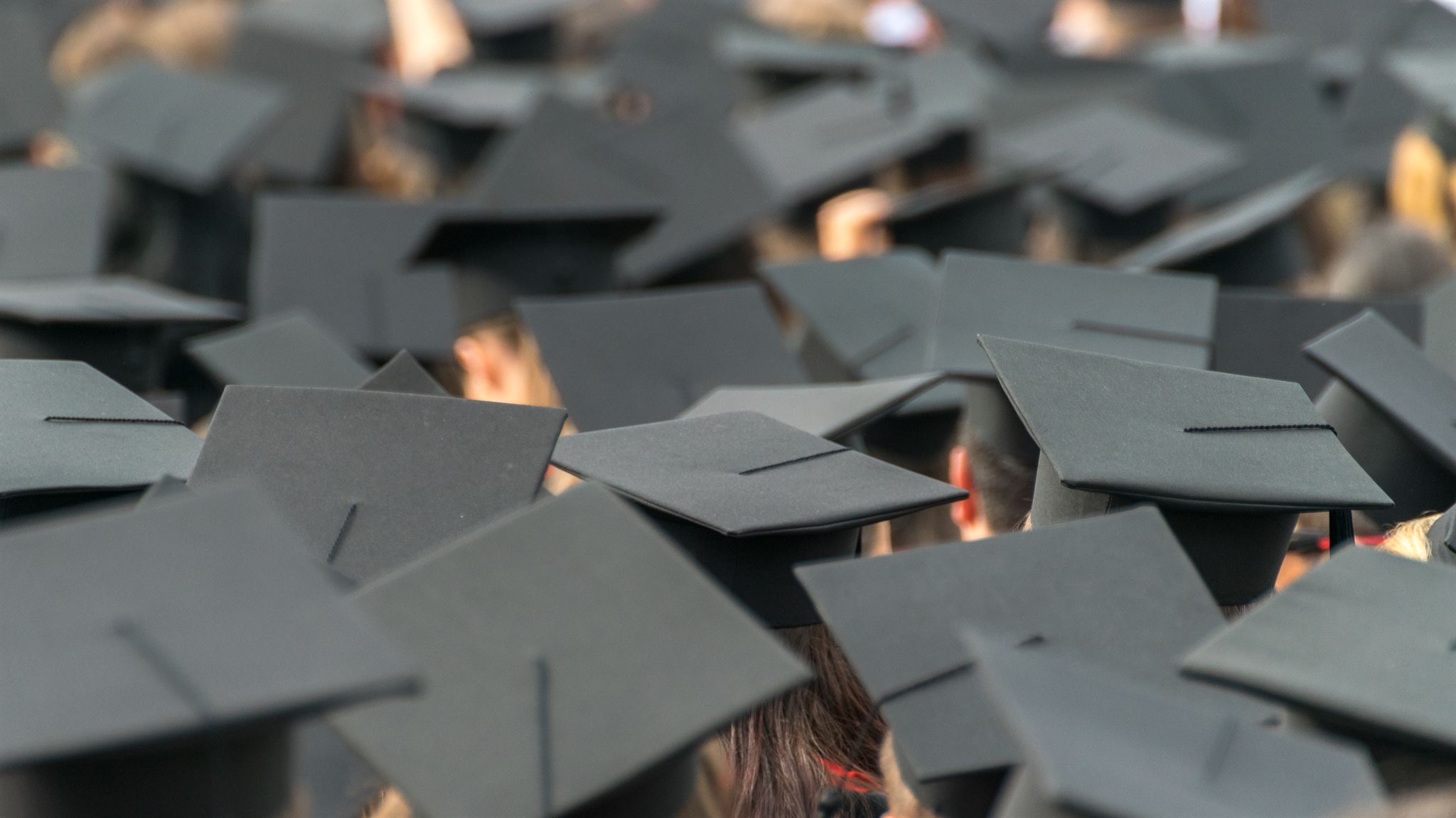 Students-wearing-mortarboards